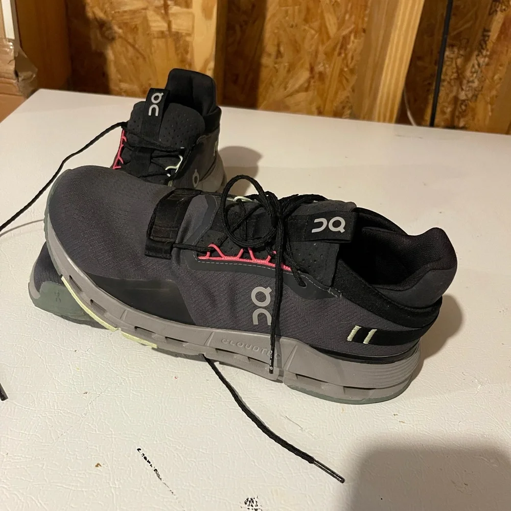 On Running Women’s Athletic Sneakers with Gray Sole and pink and green accents.